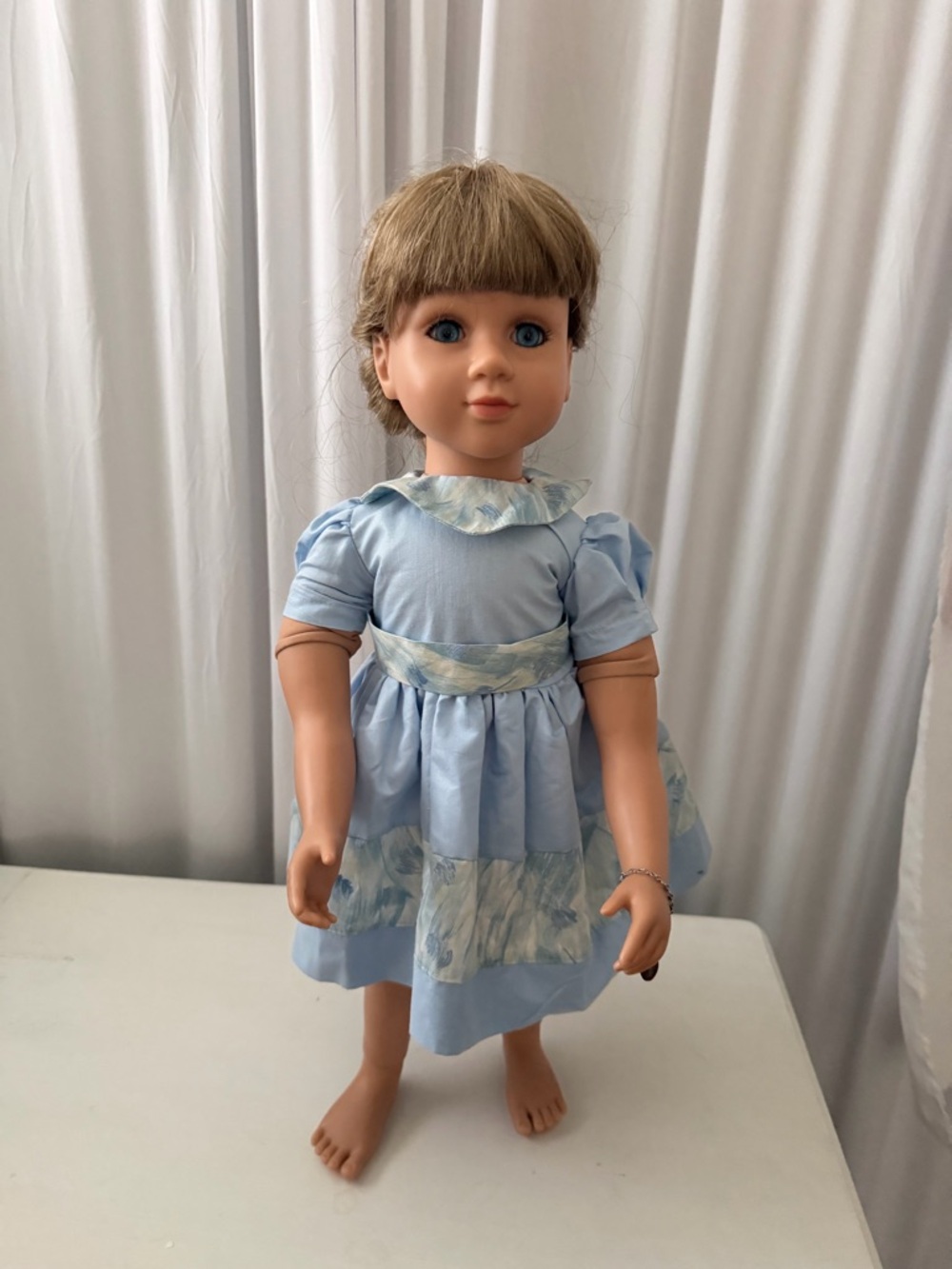My twinn doll. Very cute blond hair with blue eyes 23”